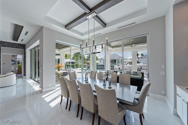 dining area with coffered ceiling, a chandelier, and light tile patterned floors