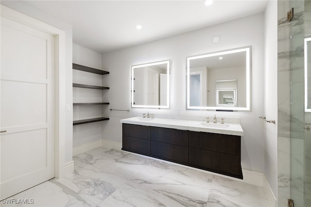 bathroom featuring an enclosed shower and vanity