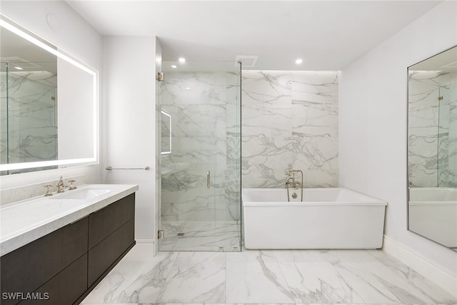 bathroom featuring vanity and independent shower and bath