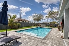 view of pool with a patio area