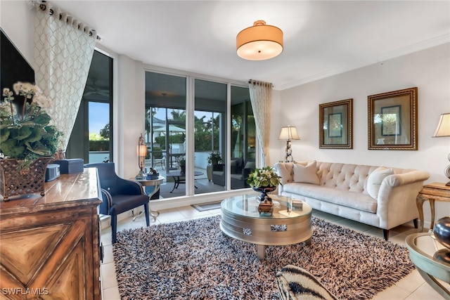 living room featuring ornamental molding and light tile patterned floors