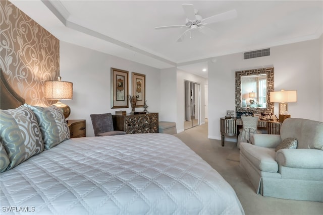 bedroom with light colored carpet and ceiling fan