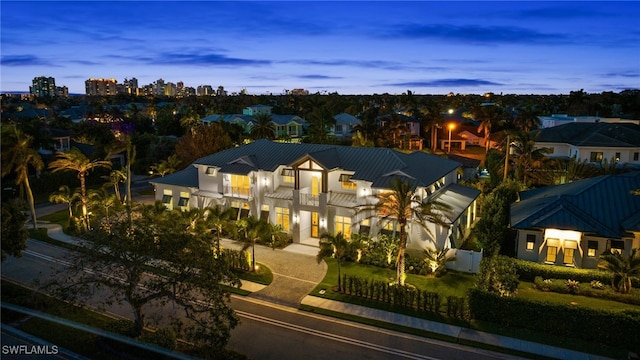 view of front of house with a balcony