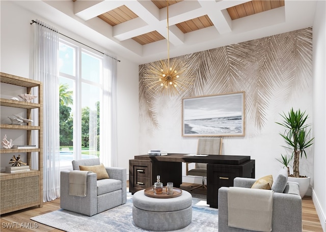 sitting room featuring beam ceiling, light wood-type flooring, coffered ceiling, and a notable chandelier