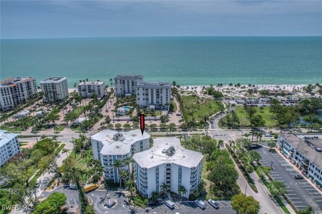 bird's eye view featuring a water view and a view of city