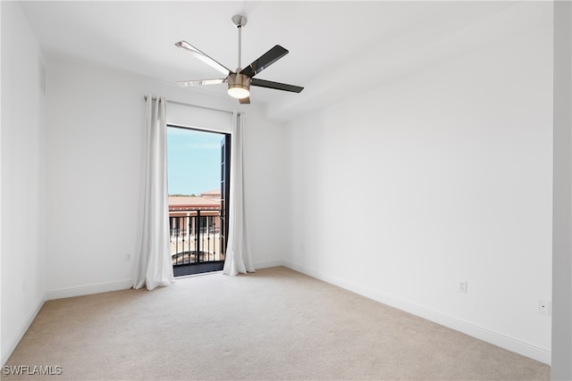 empty room with light carpet and ceiling fan