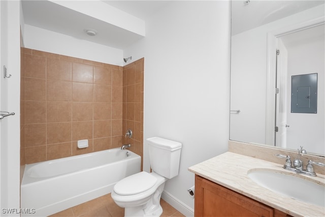 full bathroom with toilet, tile patterned flooring, tiled shower / bath combo, vanity, and electric panel