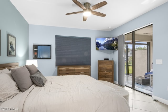 tiled bedroom with access to outside and ceiling fan