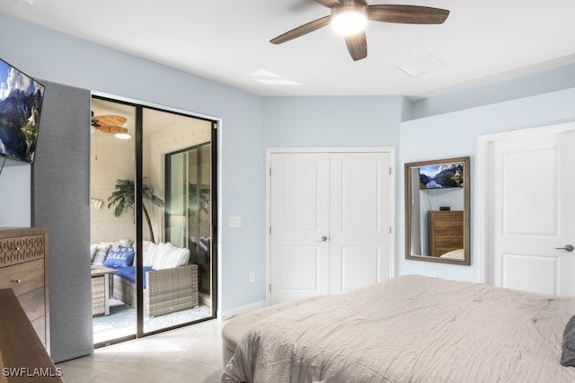 tiled bedroom featuring ceiling fan