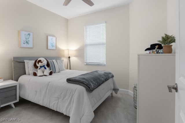 tiled bedroom with ceiling fan