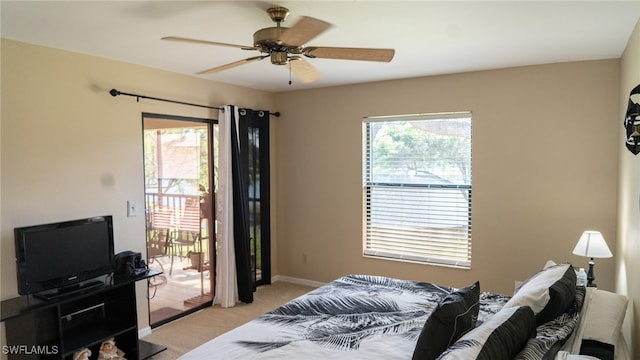 carpeted bedroom with access to outside, multiple windows, and ceiling fan