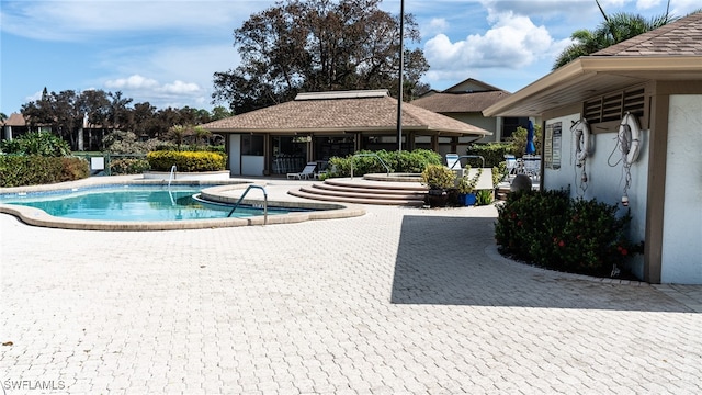 view of pool with a patio area