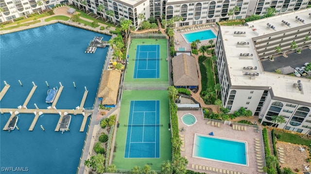 birds eye view of property featuring a water view