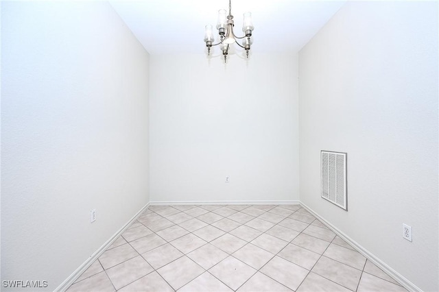 7670 Meadow Lakes Dr Unit 1501, Naples, FL 34104 - empty room with baseboards, visible vents, and a notable chandelier