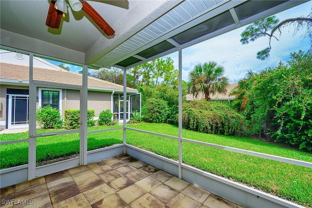 7670 Meadow Lakes Dr Unit 1501, Naples, FL 34104 - unfurnished sunroom featuring ceiling fan