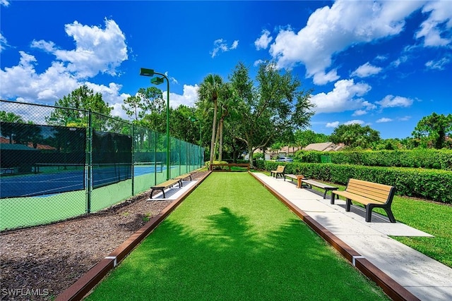 7670 Meadow Lakes Dr Unit 1501, Naples, FL 34104 - view of home's community with fence and a tennis court
