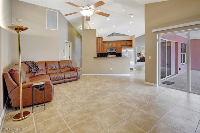 living room featuring light tile patterned flooring, high vaulted ceiling, and ceiling fan