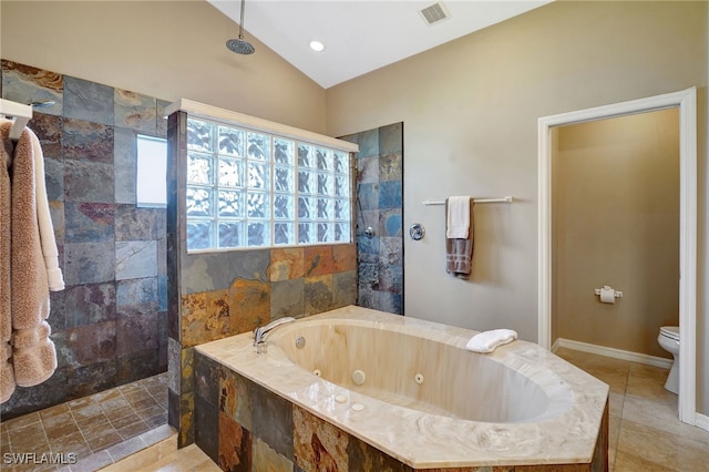 bathroom featuring toilet, lofted ceiling, independent shower and bath, and tile patterned flooring