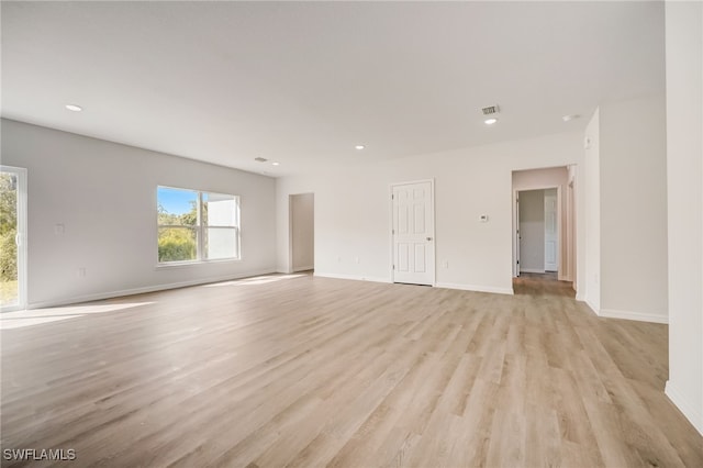 unfurnished room featuring light wood-type flooring