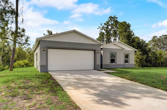 ranch-style house featuring a garage and a front lawn