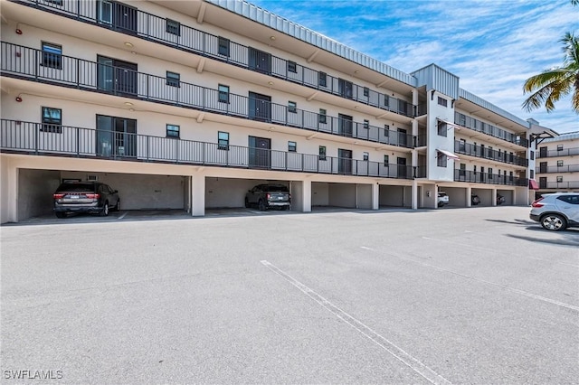803 River Point Dr Unit 306B, Naples, FL 34102 - view of property with parking