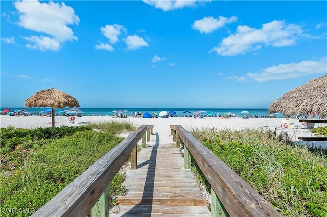 803 River Point Dr Unit 306B, Naples, FL 34102 - water view featuring a view of the beach