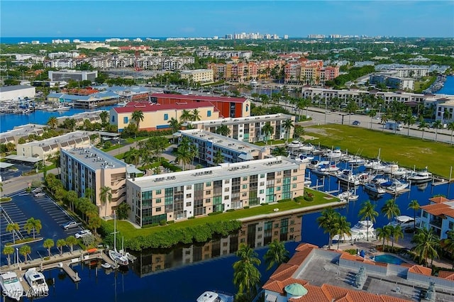 803 River Point Dr Unit 306B, Naples, FL 34102 - bird's eye view featuring a city view and a water view