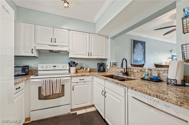 803 River Point Dr Unit 306B, Naples, FL 34102 - kitchen featuring a sink, under cabinet range hood, white appliances, and ornamental molding