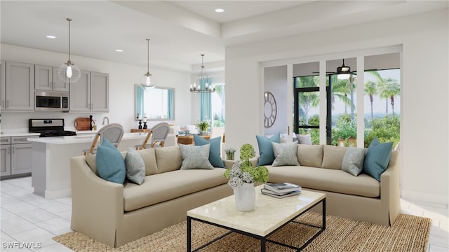 tiled living room featuring an inviting chandelier and a healthy amount of sunlight