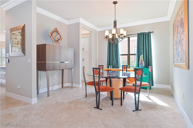 dining area with crown molding and a chandelier