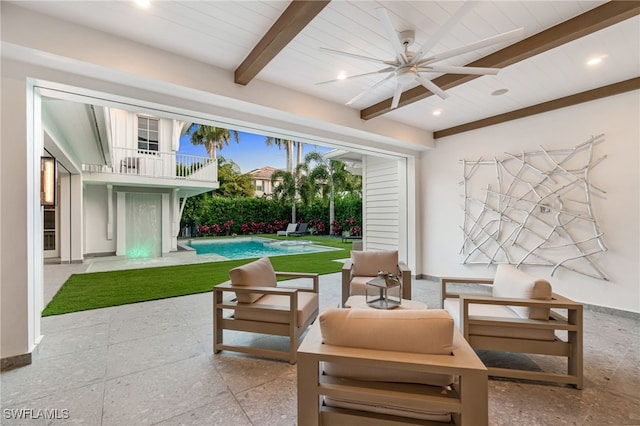 view of patio with a balcony, an outdoor hangout area, and ceiling fan