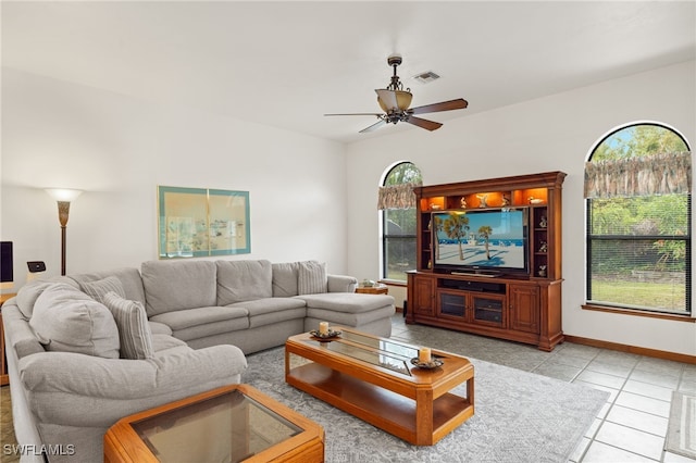 18351 Leetana Rd, North Fort Myers, FL 33917 - living area featuring light tile patterned floors, visible vents, a ceiling fan, and baseboards