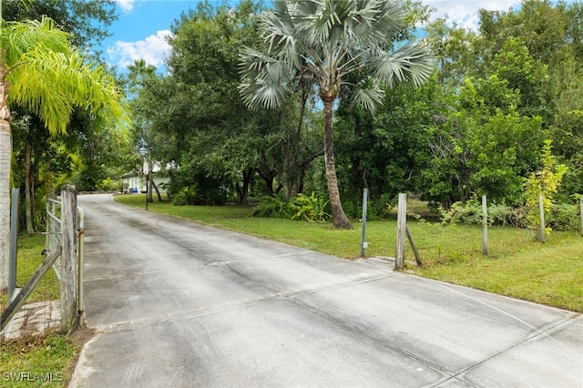 18351 Leetana Rd, North Fort Myers, FL 33917 - view of road featuring concrete driveway