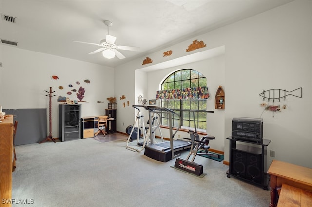 exercise area with carpet flooring and ceiling fan