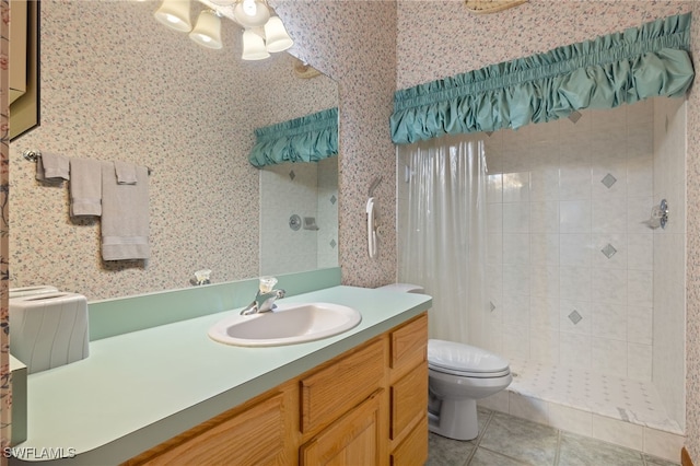 bathroom with toilet, vanity, tile patterned floors, and a shower with shower curtain