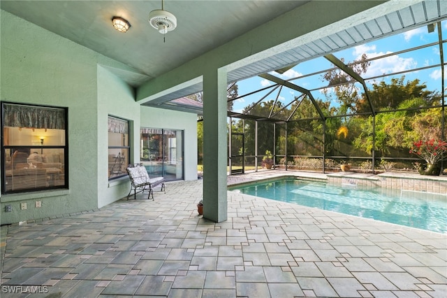 view of pool featuring a patio and a lanai