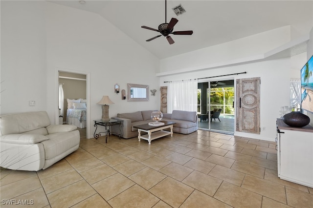 living room with light tile patterned flooring, high vaulted ceiling, and ceiling fan