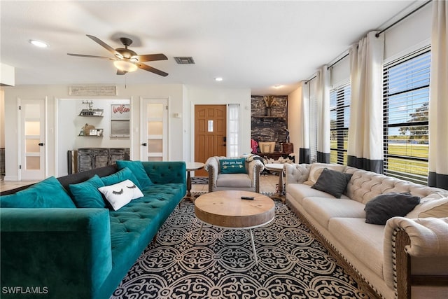 living room with ceiling fan