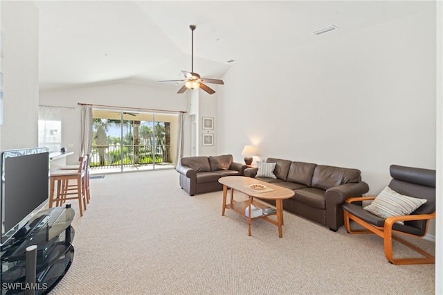 carpeted living room featuring high vaulted ceiling and ceiling fan