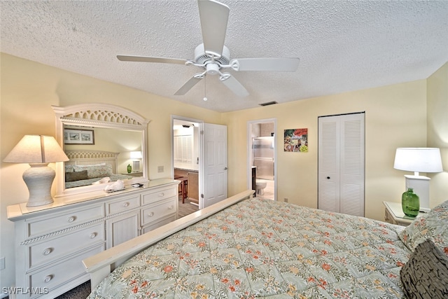 bedroom featuring a closet, ceiling fan, a textured ceiling, and ensuite bath