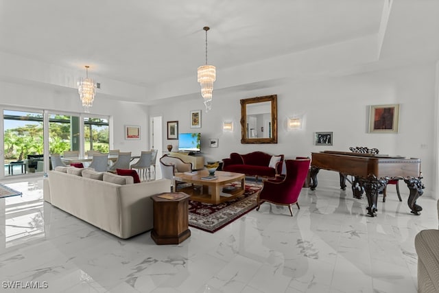 living room featuring a chandelier