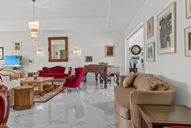 living room featuring a notable chandelier