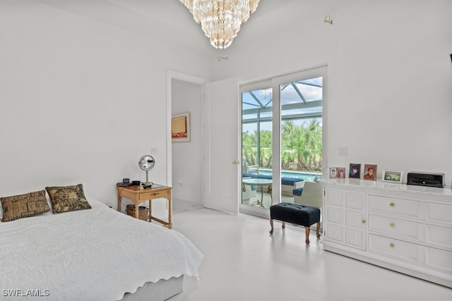 bedroom with a notable chandelier and access to exterior