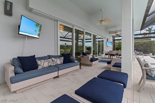 view of patio featuring an outdoor hangout area and ceiling fan