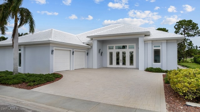 prairie-style house featuring a garage