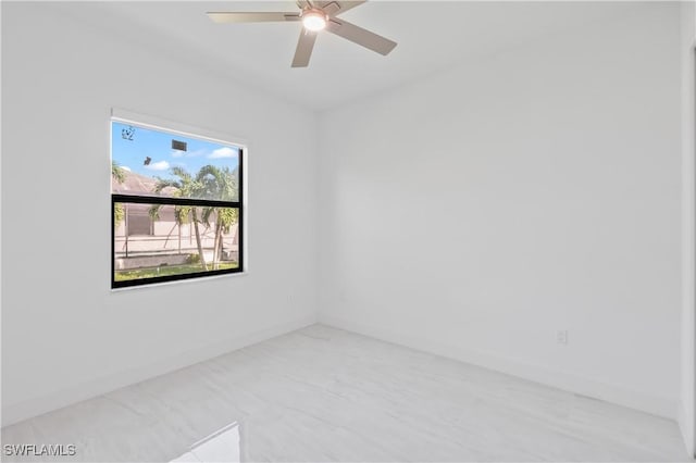 spare room featuring ceiling fan