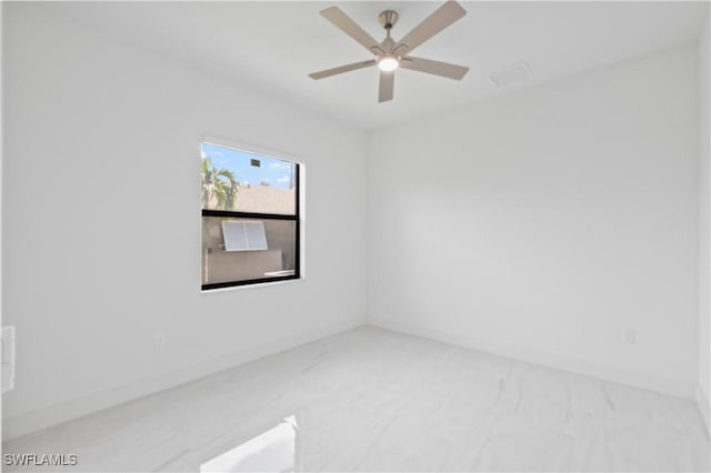 spare room featuring ceiling fan