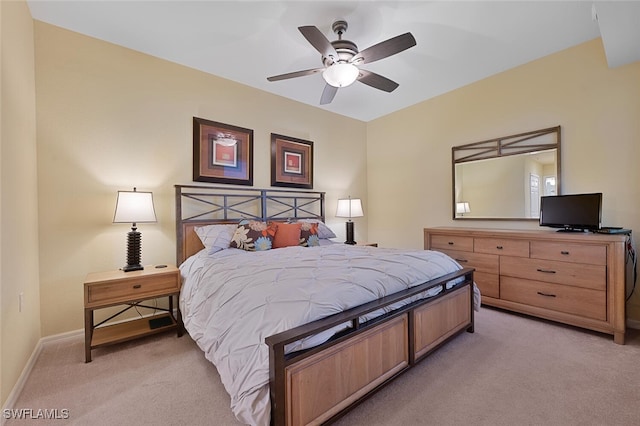 bedroom with light carpet and ceiling fan