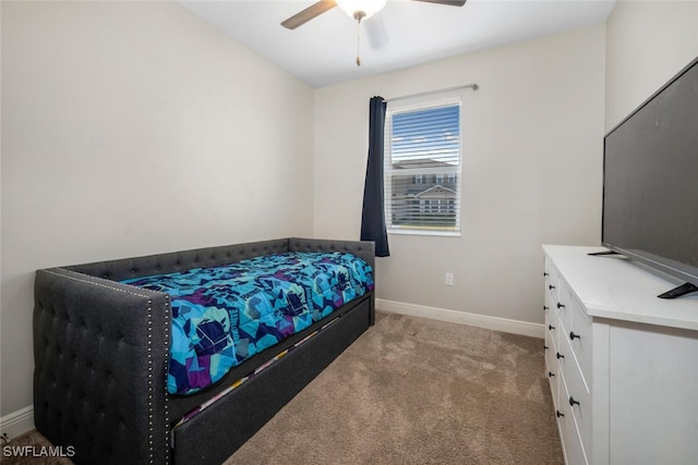 bedroom featuring ceiling fan and light colored carpet