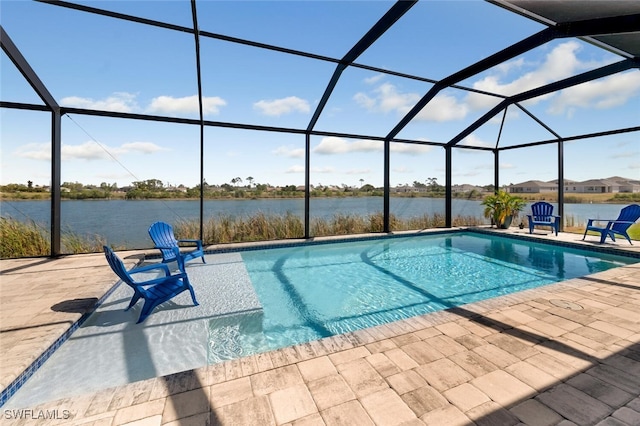 view of swimming pool with a water view, a patio, and a lanai